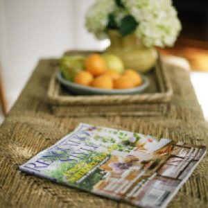 Fresh Fruits Along With Magazine On Table
